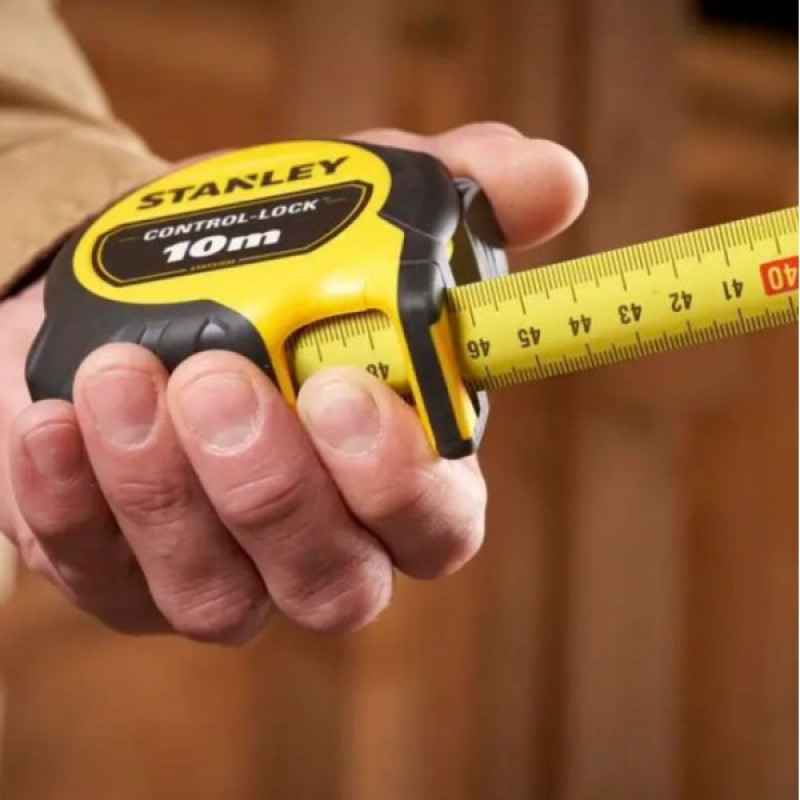 Вимірювальна рулетка Stanley STHT37233-0 Control-lock 10мх25мм в обгумованому корпусі з подвійною шкалою